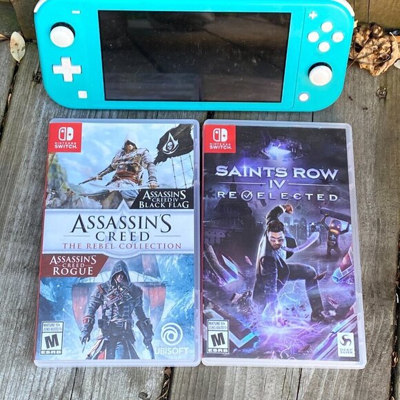 Nintendo Switch Lite Blue Bundle With 2 Games - Assassins Creed & Saints Row - Picture 5 of 7